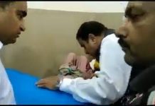 Here is another video of the CM inside the hospital, speaking to patients and the mother and child can clearly be seen behind him.