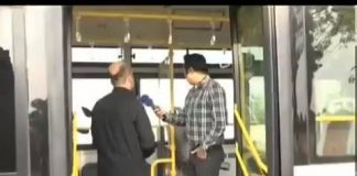 Peshawar Development Authority Media Coordinator Umar Afridi shows the new hybrid Peshawar BRT Bus on Samaa TV